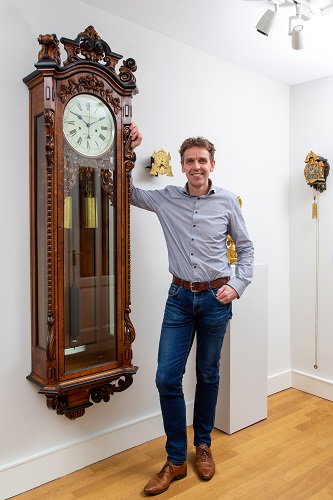 A very large English oak striking wall regulator, Amstrong Manchester, circa 1880.